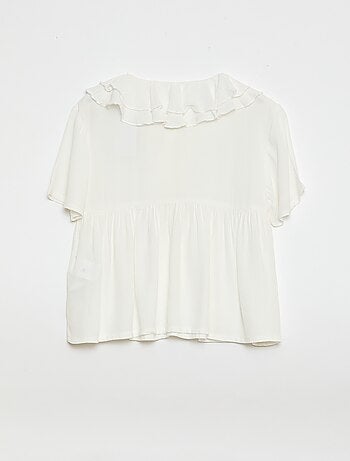 Top van licht tricot met motiefje