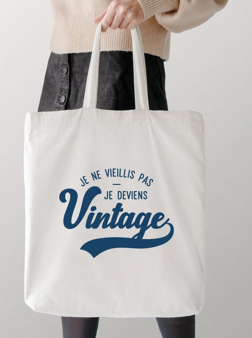 Totebag JE NE VIEILLIS PAS JE DEVIENS VINTAGE - Kiabi Totebag JE NE VIEILLIS PAS JE DEVIENS VINTAGE - Kiabi