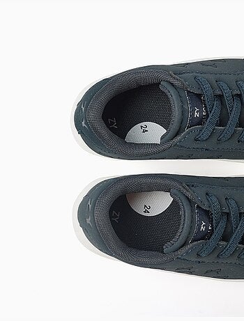 Trainers met reliëfbogen en elastische veters