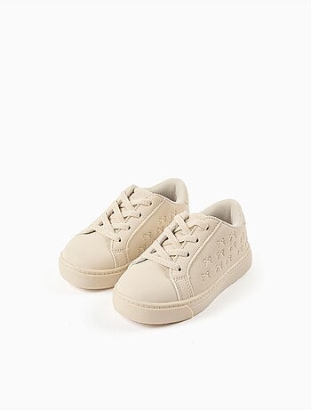 Trainers met reliëfstrikken en elastische veters