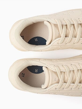 Trainers met reliëfstrikken en elastische veters