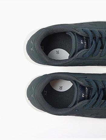 Trainers met reliëfstrikken en elastische veters