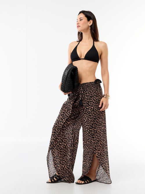 Triangelbikinitop van jerseytricot met textuur en strikbandjes - Kiabi Triangelbikinitop van jerseytricot met textuur en strikbandjes - Kiabi