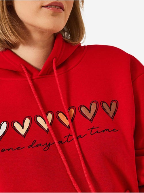 Triple yarn geborstelde hoodie met hartprint en capuchon lucci - Kiabi Triple yarn geborstelde hoodie met hartprint en capuchon lucci - Kiabi