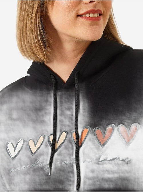 Triple yarn geborstelde hoodie met hartprint en capuchon lucci - Kiabi Triple yarn geborstelde hoodie met hartprint en capuchon lucci - Kiabi