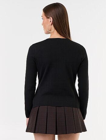 Trui met mandarijndetails