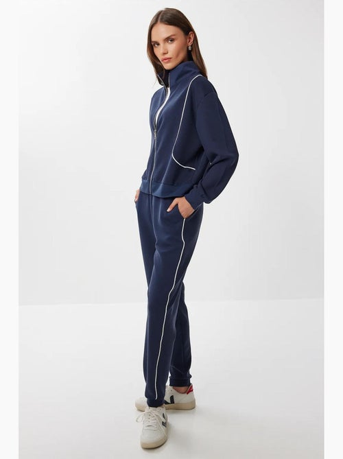 Tweedelige set met sweatshirt met rits en jogger met contrasterende biesdetails istanbul - Kiabi Tweedelige set met sweatshirt met rits en jogger met contrasterende biesdetails istanbul - Kiabi