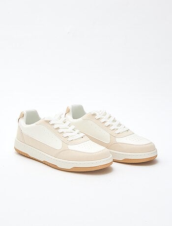 Tweekleurige sneakers met goudkleurige details