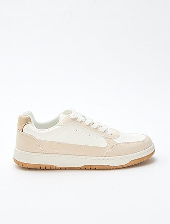 Tweekleurige sneakers met goudkleurige details