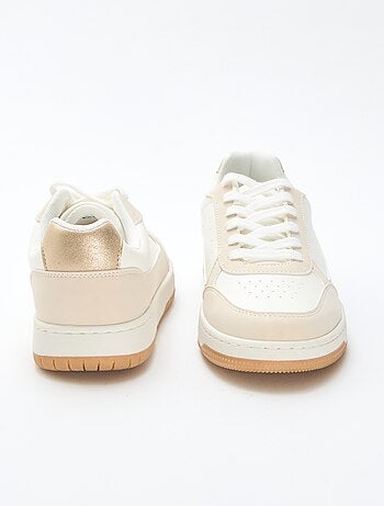Tweekleurige sneakers met goudkleurige details