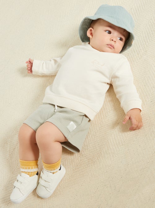 Tweekleurige sneakers met klittenband - Kiabi Tweekleurige sneakers met klittenband - Kiabi