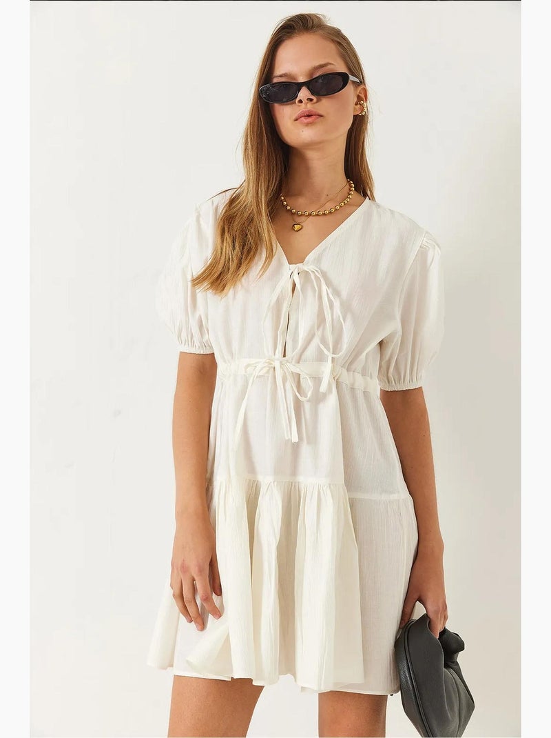 V-hals tamara mini-jurk met strik aan de voorkant lucci Klei-beige - Kiabi