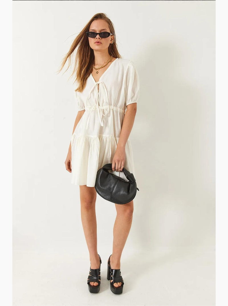 V-hals tamara mini-jurk met strik aan de voorkant lucci Klei-beige - Kiabi