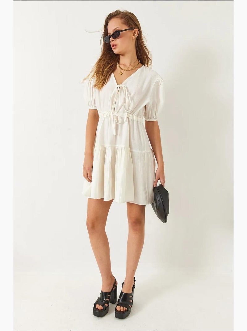 V-hals tamara mini-jurk met strik aan de voorkant lucci Klei-beige - Kiabi