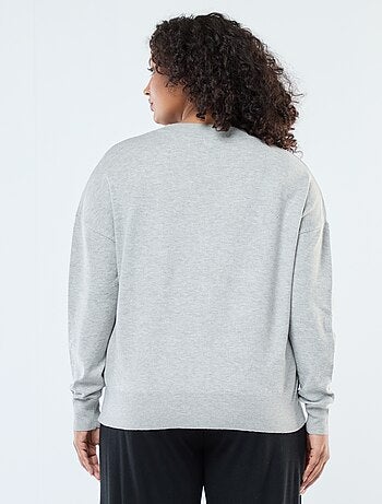 Vest van dun tricot met knoopsluiting