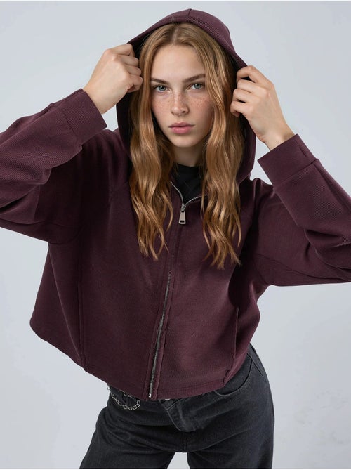 Veste à capuche zippée avec détails élastiques busem - Kiabi Veste à capuche zippée avec détails élastiques busem - Kiabi