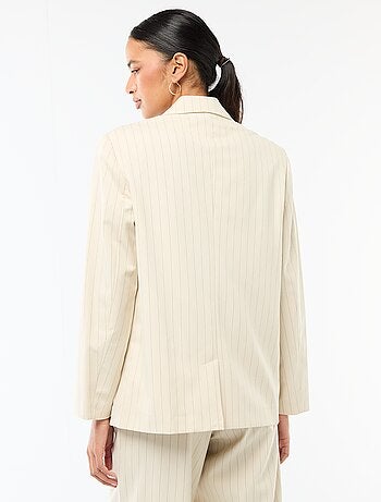 Veste de tailleur avec ouverture double boutonnage