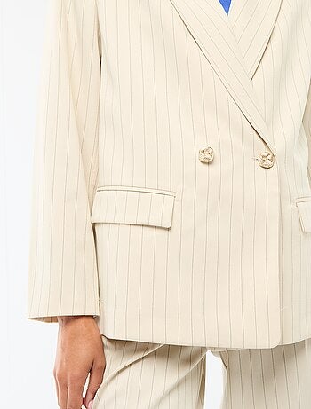 Veste de tailleur avec ouverture double boutonnage