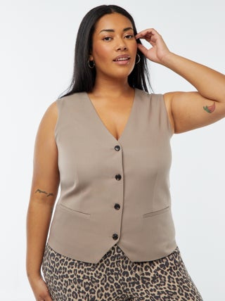Veste sans manches avec ouverture boutonnée