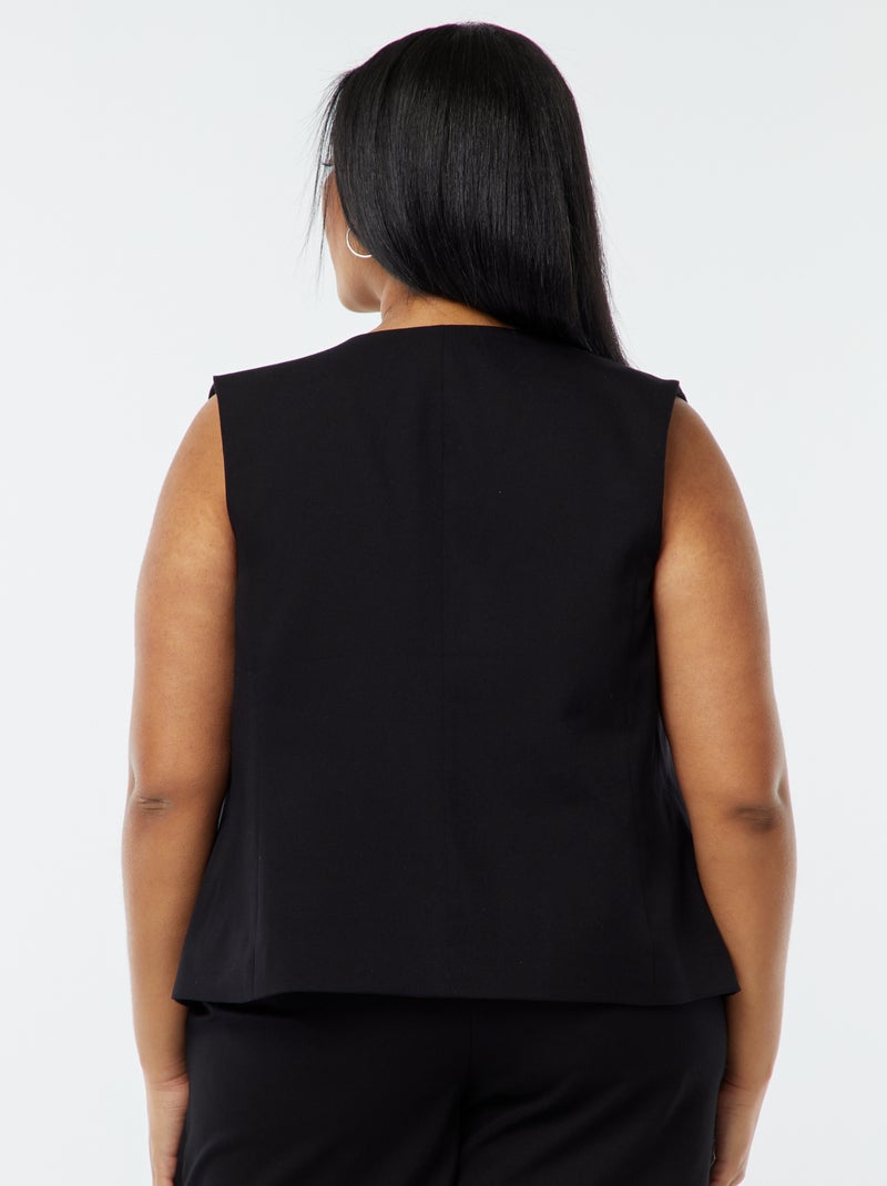 Veste sans manches avec ouverture boutonnée noir - Kiabi