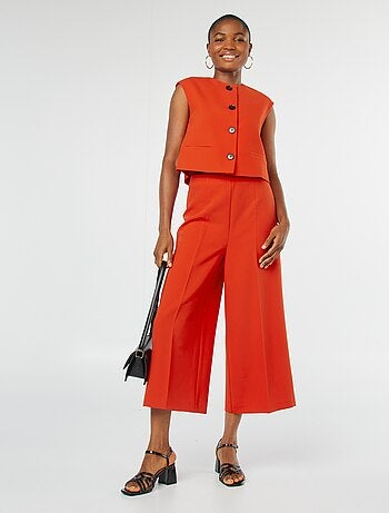 Veste sans manches avec ouverture boutonnée