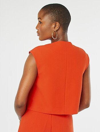 Veste sans manches avec ouverture boutonnée