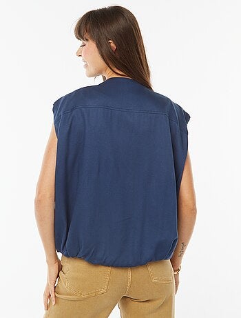 Veste sans manches satinée et zippée