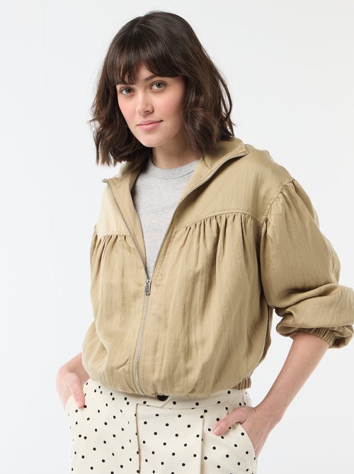 Veste unie zippée avec manches bouffantes - Kiabi