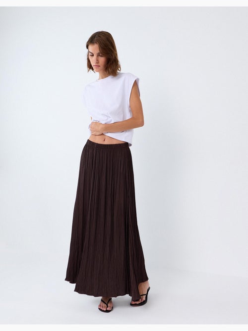 Vloeiende midi-rok, mo fashion - Kiabi Vloeiende midi-rok, mo fashion - Kiabi