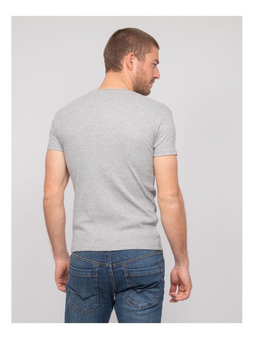 Walter geribbeld katoenen t-shirt met ronde hals - Kiabi Walter geribbeld katoenen t-shirt met ronde hals - Kiabi