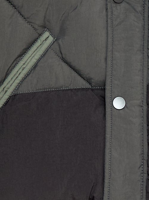 Waterafstotend, gewatteerd donsjack met colorblockpatroon - Kiabi Waterafstotend, gewatteerd donsjack met colorblockpatroon - Kiabi