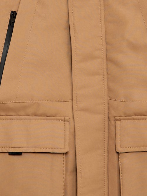 Waterafstotende parka met capuchon - Kiabi Waterafstotende parka met capuchon - Kiabi