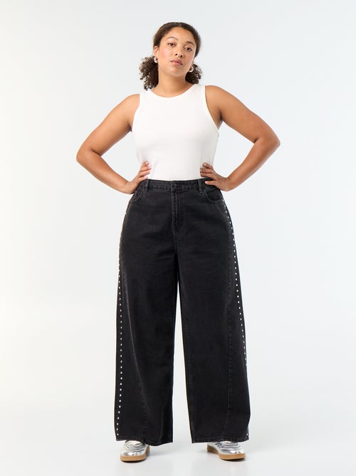 Wide leg jeans met fantasie uitsnijdingen en studs - Kiabi Wide leg jeans met fantasie uitsnijdingen en studs - Kiabi