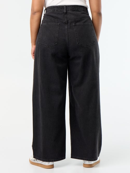 Wide leg jeans met fantasie uitsnijdingen en studs - Kiabi Wide leg jeans met fantasie uitsnijdingen en studs - Kiabi