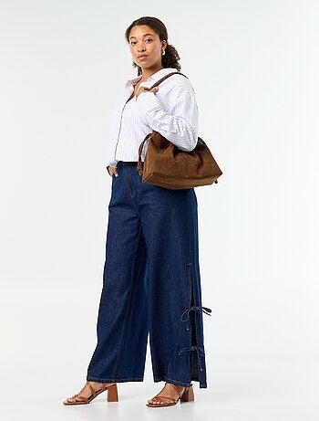 Wide leg jeans met fantasieknopen aan de zijkanten