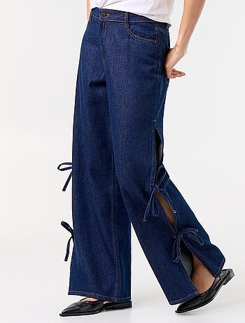Wide leg-jeans met fantasievolle strikken aan de zoom