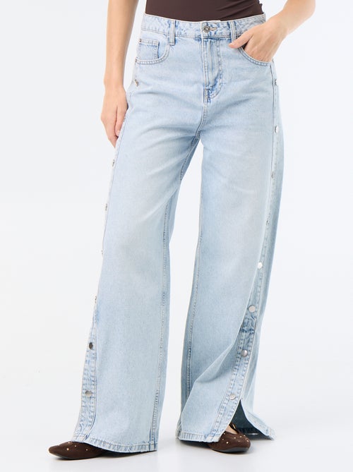 Wide leg jeans / wijde pasvorm met sierdrukknopen aan de zijkanten - Kiabi Wide leg jeans / wijde pasvorm met sierdrukknopen aan de zijkanten - Kiabi
