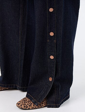 Wide leg jeans / wijde pasvorm met sierdrukknopen aan de zijkanten