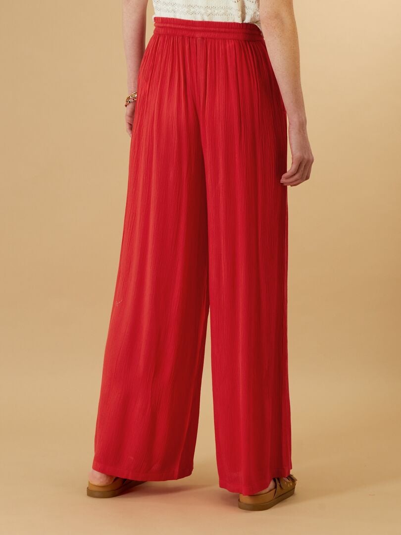 Wijde broek met elastiek ROOD Kiabi 18.00€