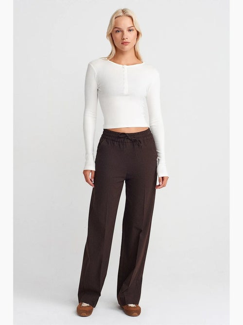 Wijde broek met elastische taille dilvin - Kiabi Wijde broek met elastische taille dilvin - Kiabi