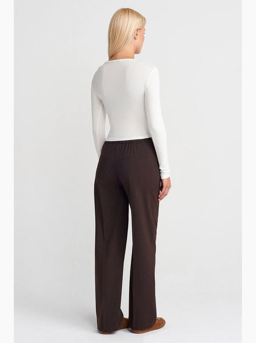 Wijde broek met elastische taille dilvin - Kiabi Wijde broek met elastische taille dilvin - Kiabi