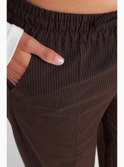Wijde broek met elastische taille dilvin - Kiabi Wijde broek met elastische taille dilvin - Kiabi