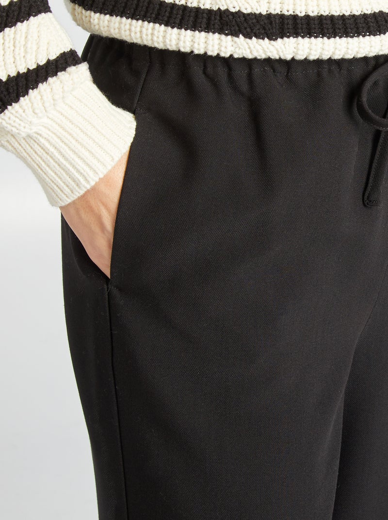 Wijde broek met elastische taille en aantrekkoordjes zwart - Kiabi