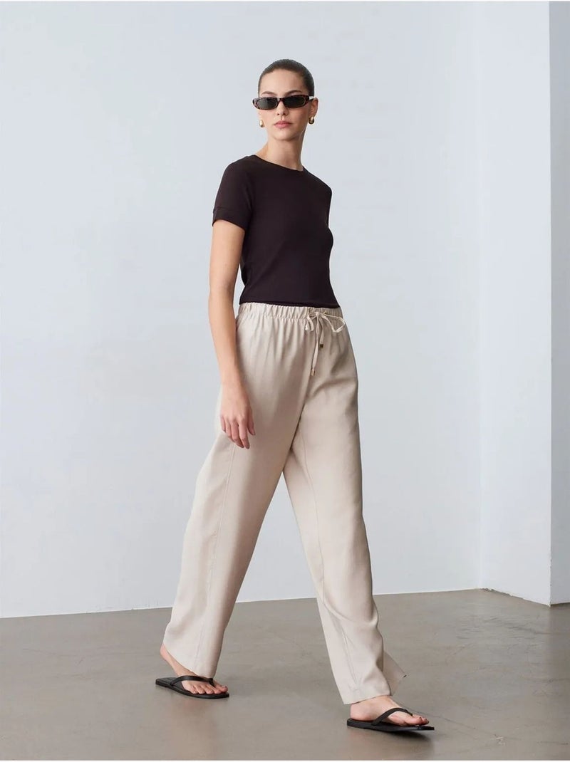 Wijde broek met elastische taille en trekkoord dilvin Zand - Kiabi