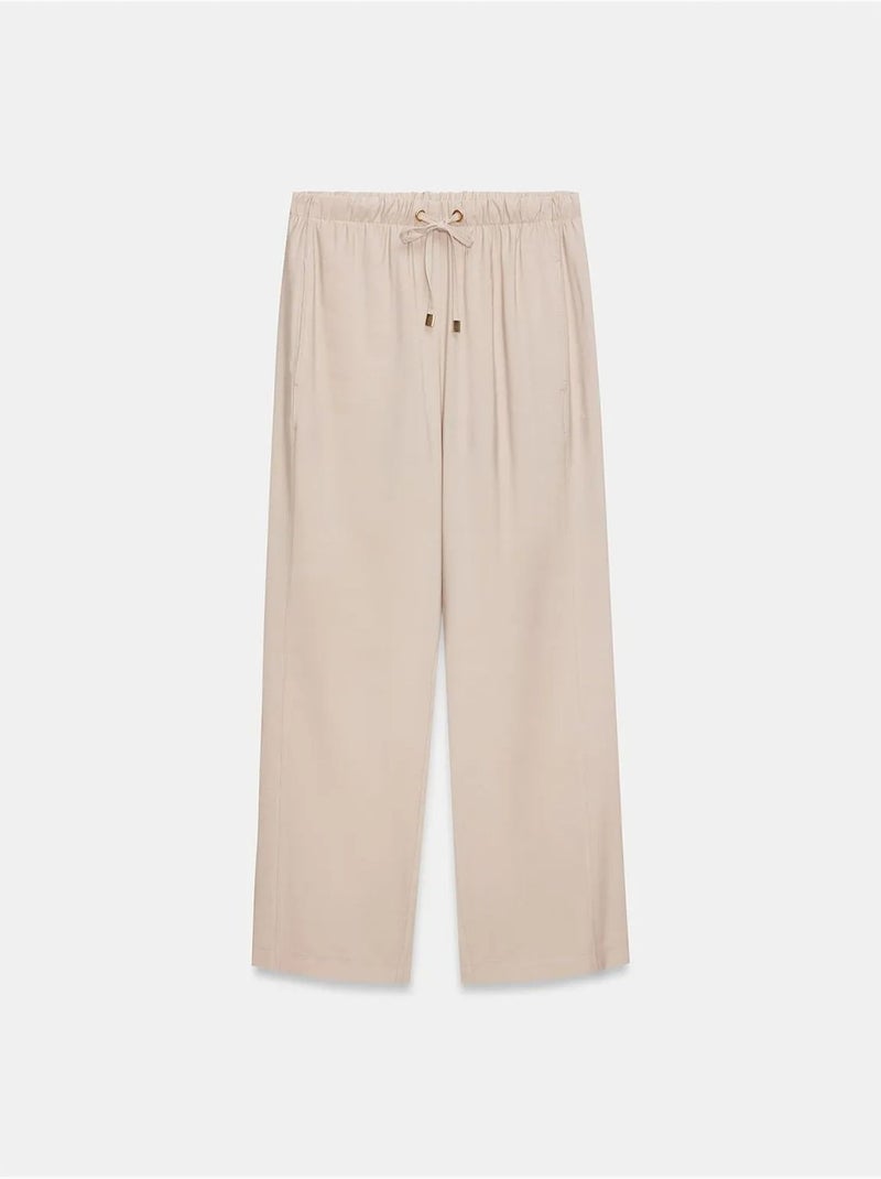 Wijde broek met elastische taille en trekkoord dilvin Zand - Kiabi