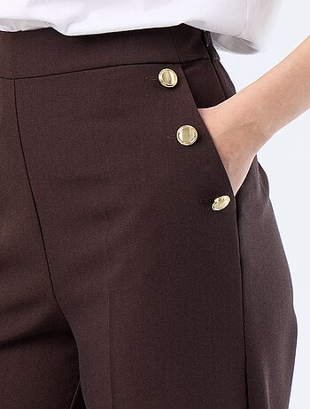 Wijde broek met fantasie goudkleurige knopen op de zakken