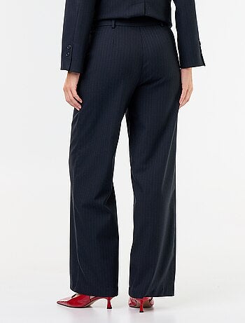 Wijde broek met goudkleurige knopen