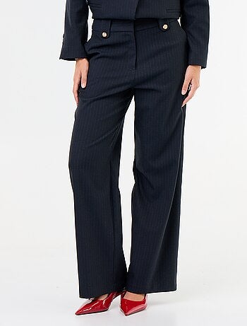 Wijde broek met goudkleurige knopen