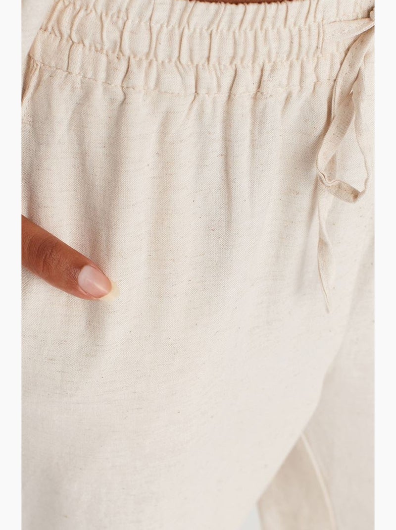Wijde broek met trekkoord in de taille dilvin Natuurlijk beige - Kiabi