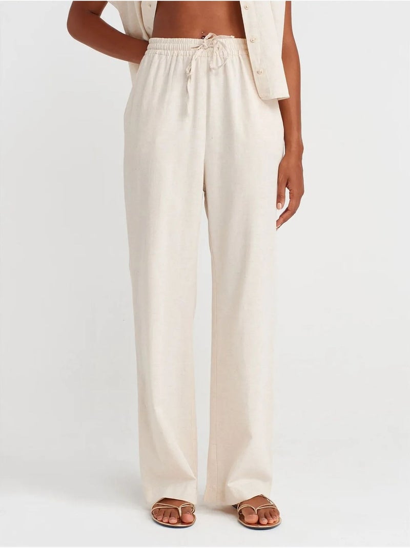 Wijde broek met trekkoord in de taille dilvin Natuurlijk beige - Kiabi